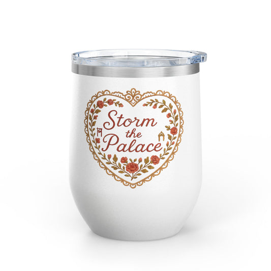 White insulated wine tumbler with heart-shaped floral design and the phrase “Storm the Palace,” featuring hidden icons like a guillotine and palace gate. aardvark dreams