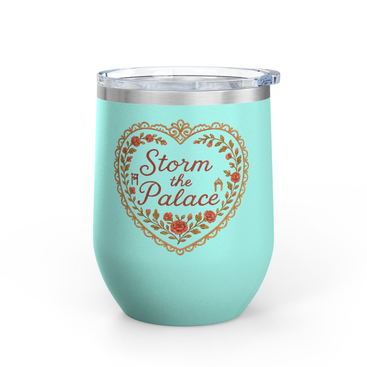 Teal insulated wine tumbler with heart-shaped floral design and the phrase “Storm the Palace,” featuring hidden icons like a guillotine and palace gate. aardvark dreams