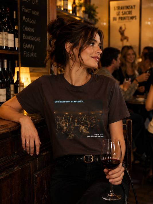 Model wearing The Rite of Spring Pandemonium T-shirt with bassoon started it design