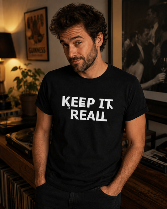 Model wearing the Keep It Reall AI glitch text T-shirt in black