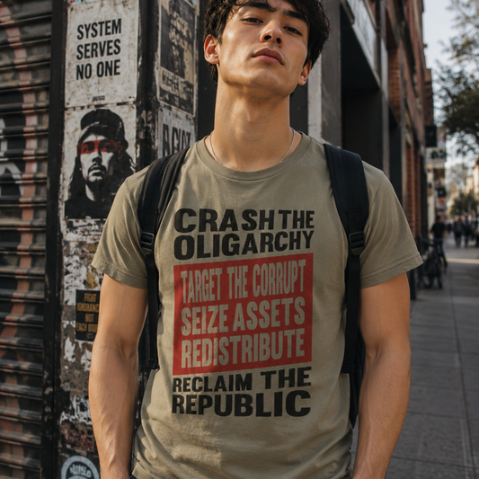 Model wearing the Crash the Oligarchy T-shirt on a city sidewalk